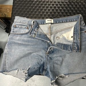 A golden Jean cutoff shorts